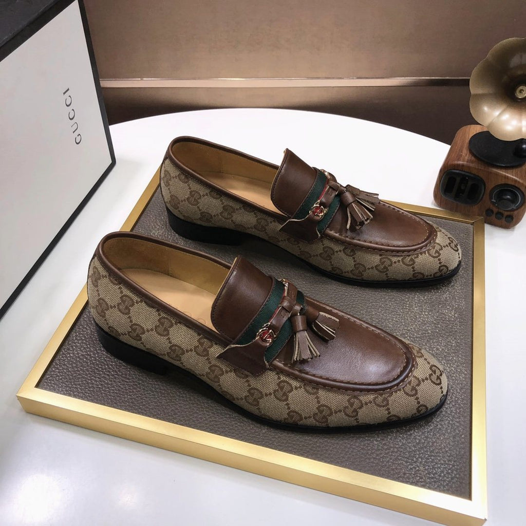 Gucci Monogram Tassel Loafers
